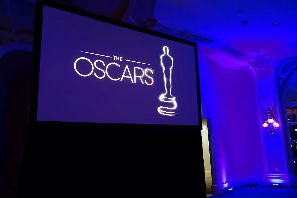 Oscars logo projected on a screen at the awards show oscars
